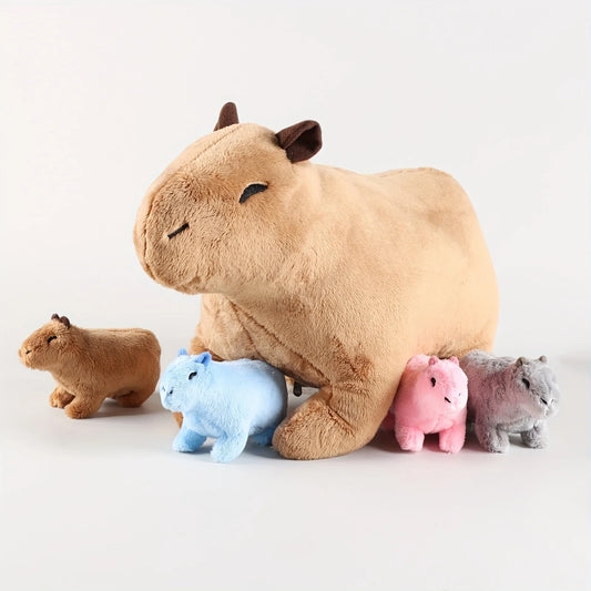 Set of small plush capybaras including a large beige one, a blue one, a pink one, and two gray ones on a white background.