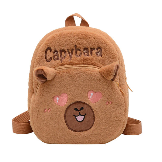 Capybara-shaped plush backpack on a white background