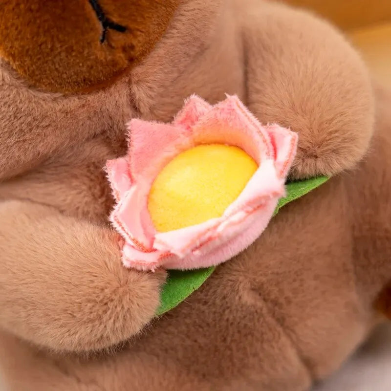 Cute Capybara Plush Toy – Soft Stuffed Animal Doll Holding Flower (25cm)