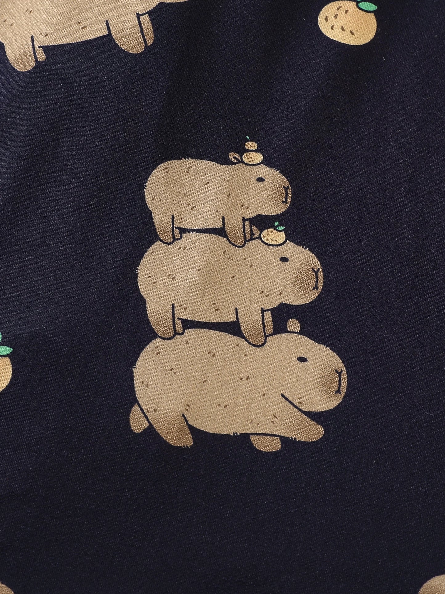 Navy fabric with beige capybara illustrations
