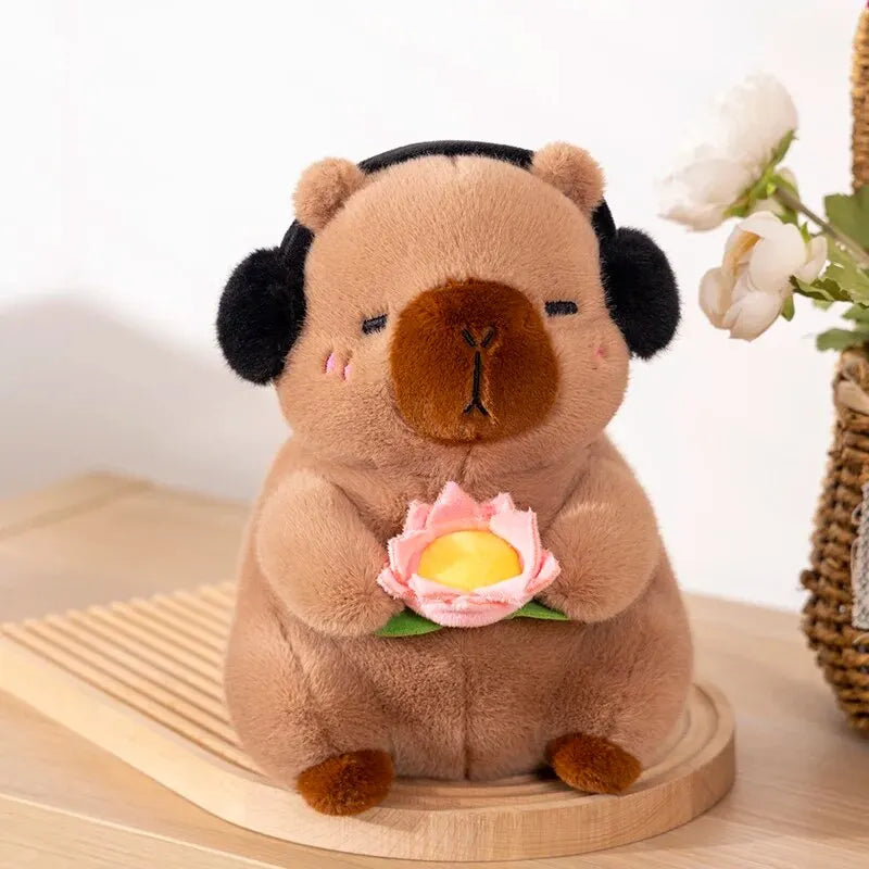 Cute Capybara Plush Toy – Soft Stuffed Animal Doll Holding Flower (25cm)